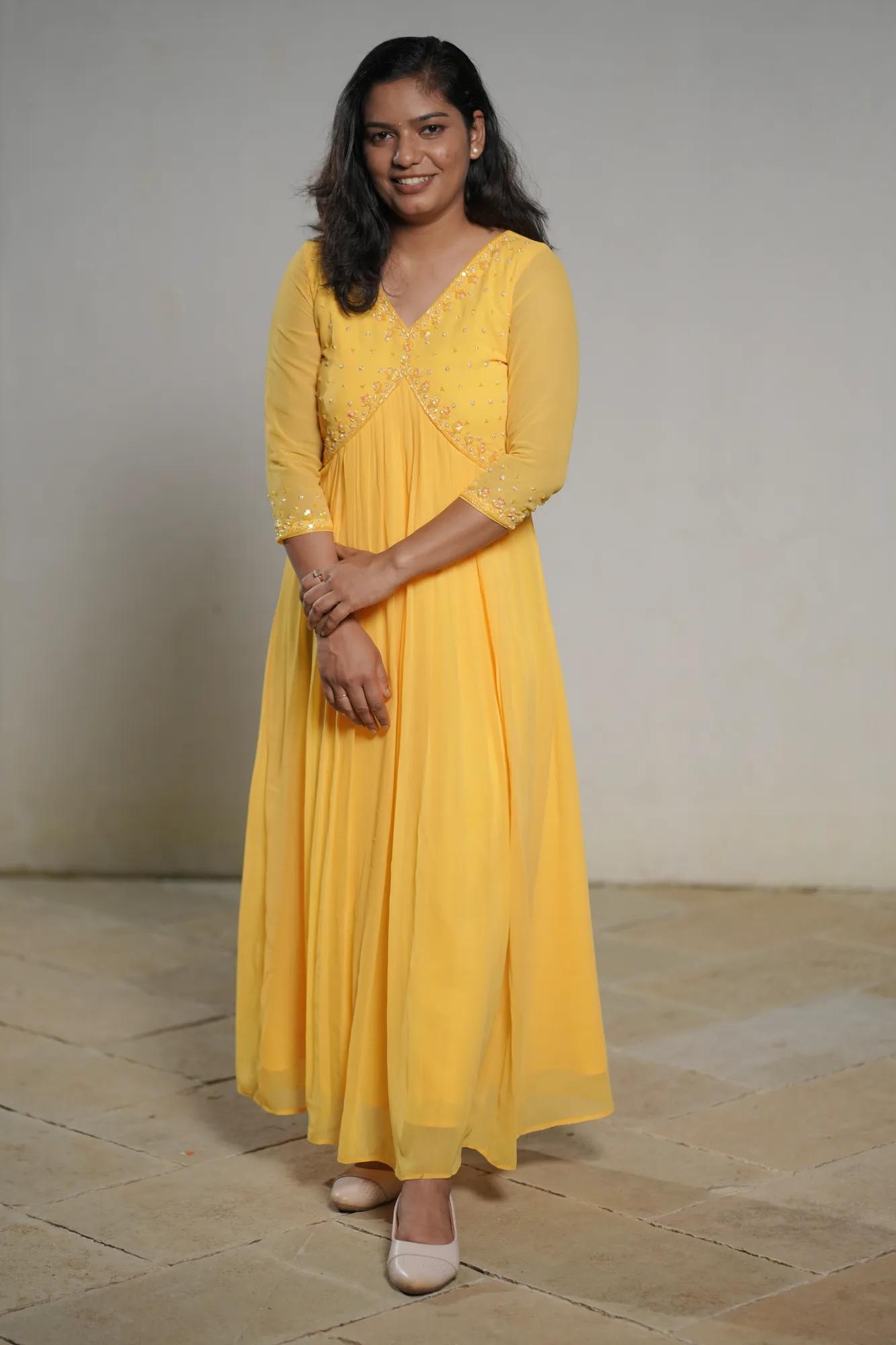 Yellow Georgette Pleated Top with Handwork
